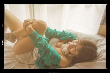 between a laugh and a music