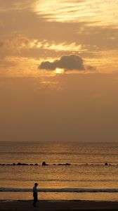 夕日とおじさん